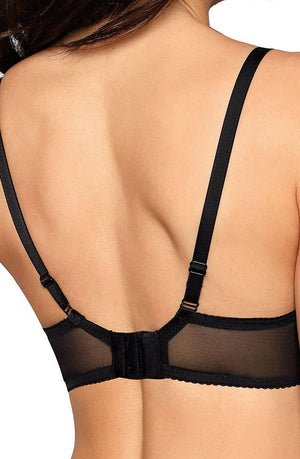 The image showcases the back view of a person wearing a Roza Anuk Black Soft Cup bra. The black bra, from the brand Roza, features adjustable shoulder straps, a hook-and-eye closure, and delicate lace trim. The person's back is visible, with long hair cascading down their neck, adding a touch of grace to the overall look.