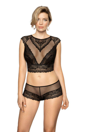 A woman wearing the Roza Ellba Black Boxer set by Roza, which includes a crop top with cap sleeves and a geometric pattern on the front, paired with lace-trimmed shorts. She has short, light-colored hair and is standing against a plain white background, facing the camera.