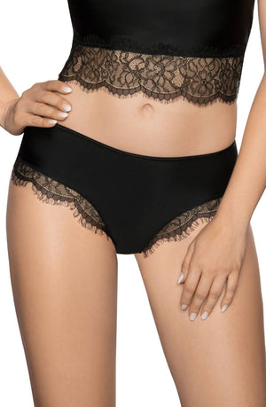 A woman is wearing Roza's Erii Black Brief, a beautifully coordinated black lingerie set with intricate lace trim. Her hands are elegantly placed on her hips, drawing attention to the midsection. The top showcases eyelash lace detailing at the hem, while the underwear features delicate lace trim and criss-cross elastic detailing around the waistband.