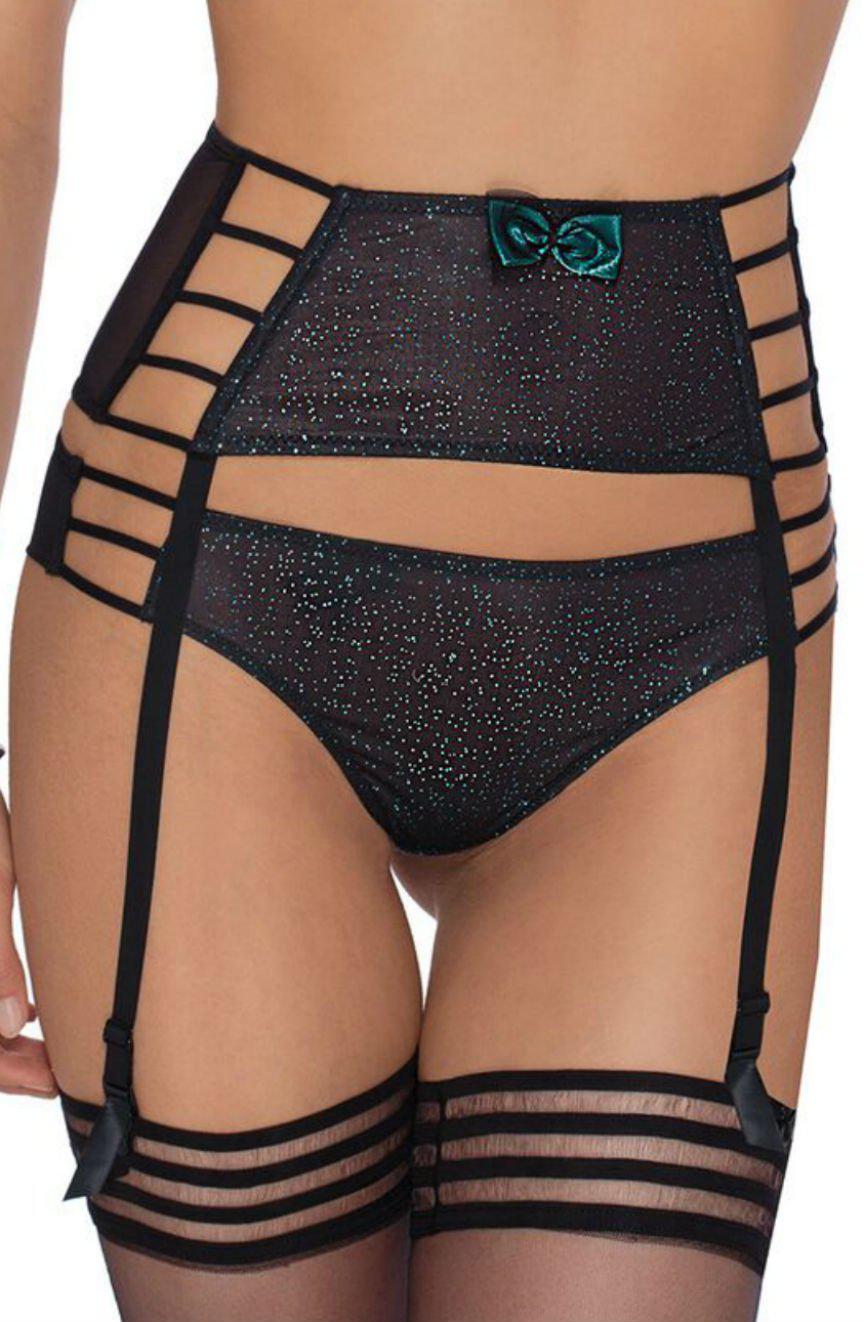 A close-up image shows a person wearing a black, sparkly lingerie set consisting of a high-waisted garter belt with attached straps and matching Roza Ilaris Brief Black panties by Roza. The garter straps are fastened to sheer black stockings, enhancing the sensual cut-out design.