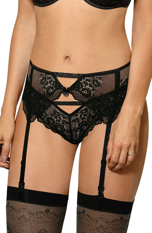 A person wearing the Roza Kena Black Suspender Belt from the Kena collection, paired with black stockings. The suspender belt by Roza features lace detailing and cut-out designs, while the stockings boast an intricate lace pattern at the top.