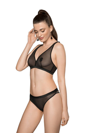 A woman with long, dark hair styled in a high ponytail is wearing the Roza Lisbet Black Soft Cup Bra from the Lisbet collection by Roza. The top features triangle cups with thin straps adorned with delicate embroidered appliques, and she is paired it with simple matching bottoms. She is posing while touching her hair and looking down with a slight smile.