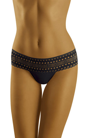 A person wearing the Wolbar Eco-Fo Black Thong Shorts, featuring a high-waisted design with intricate cut-out patterns and lace trim on the waistband. The focus is on the lower torso and hips, highlighting the environmentally friendly lingerie detail by Wolbar against a plain background.