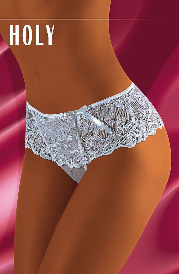 A model showcases the Wolbar Holly White Shorts by Wolbar, featuring a pair of white lace panties with a delicate ribbon bow at the front. The intricate lace trim exudes elegance, beautifully contrasting against a deep red and pink fabric backdrop. The word "HOLLY" is prominently displayed in large white font in the top left corner.