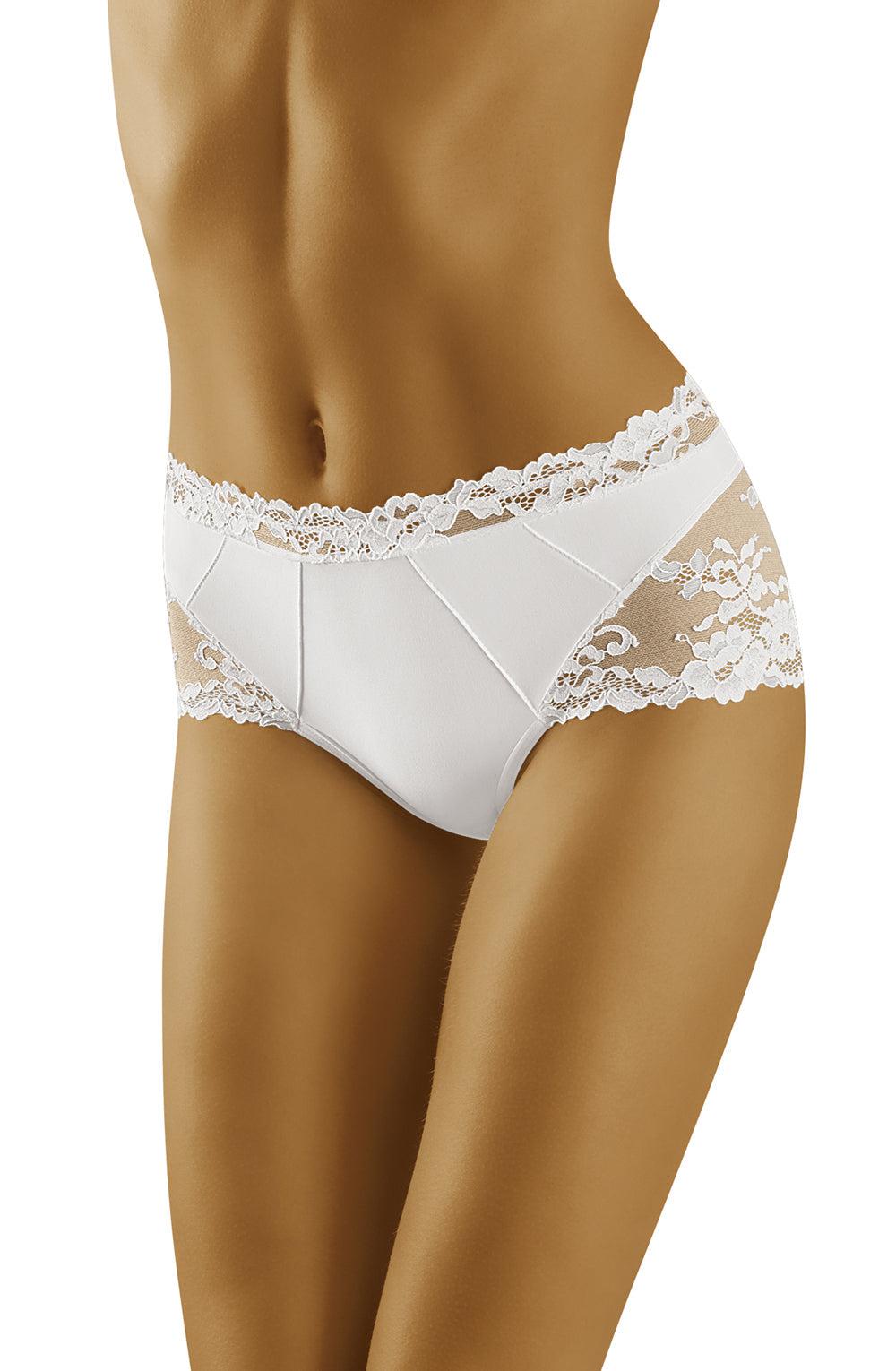 A woman is modeling the Wolbar Luxa White Brief. This exquisite underwear from Wolbar showcases intricate floral lace detailing on the waistband and sides, complemented by smooth fabric panels in the front for luxurious comfort. The woman's midsection and upper thighs are visible.