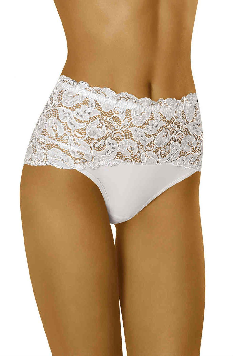 A close-up of a person wearing Wolbar's Teri White Brief, which features a stretchy waistband adorned with floral lace. The top portion is elegantly decorated with the same floral lace, while the lower part is crafted from solid fabric and includes a comfortable cotton gusset. The visible area extends from the lower chest to mid-thigh, showcasing a tan skin tone.